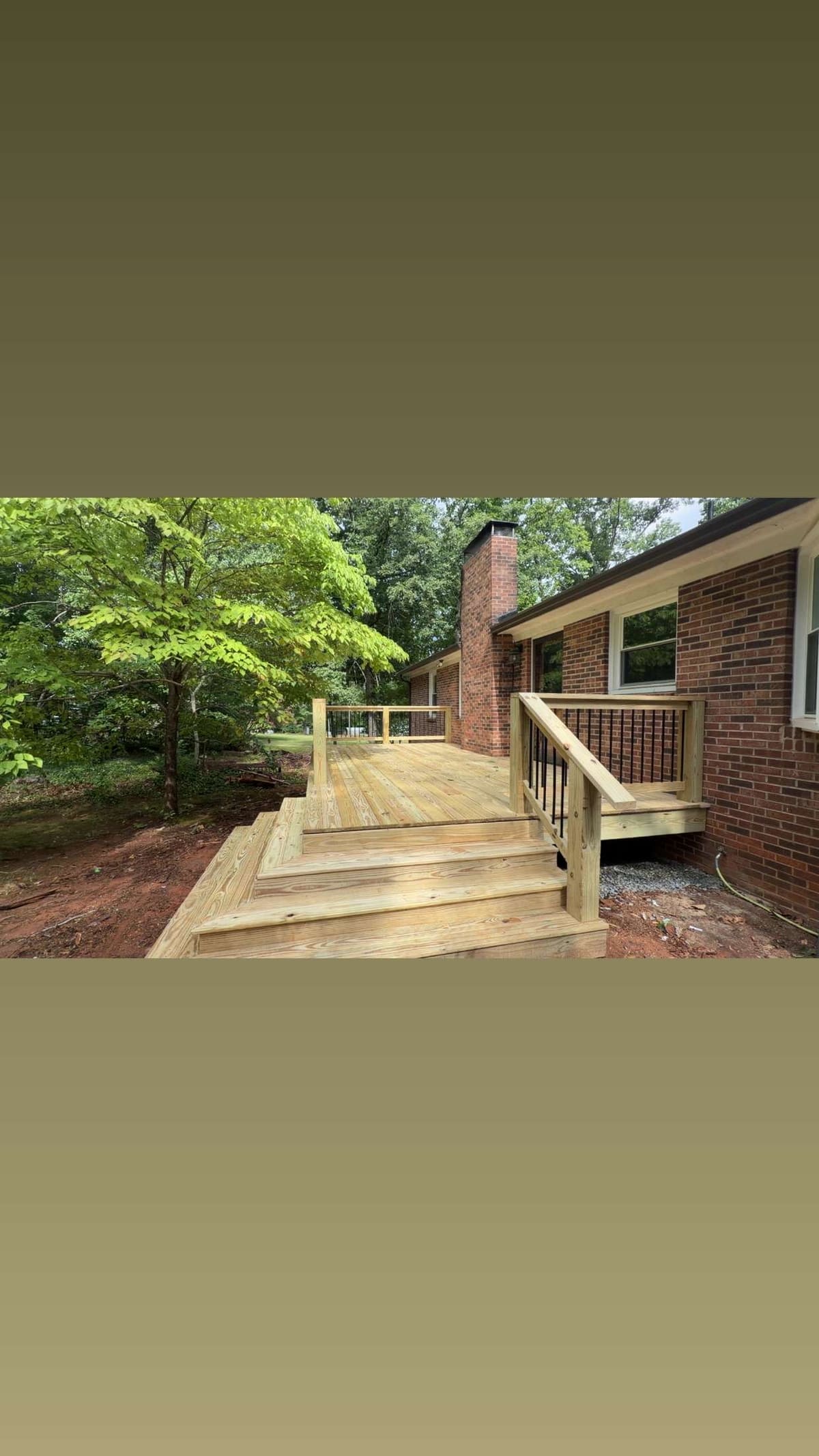 Deck with stairs and railing